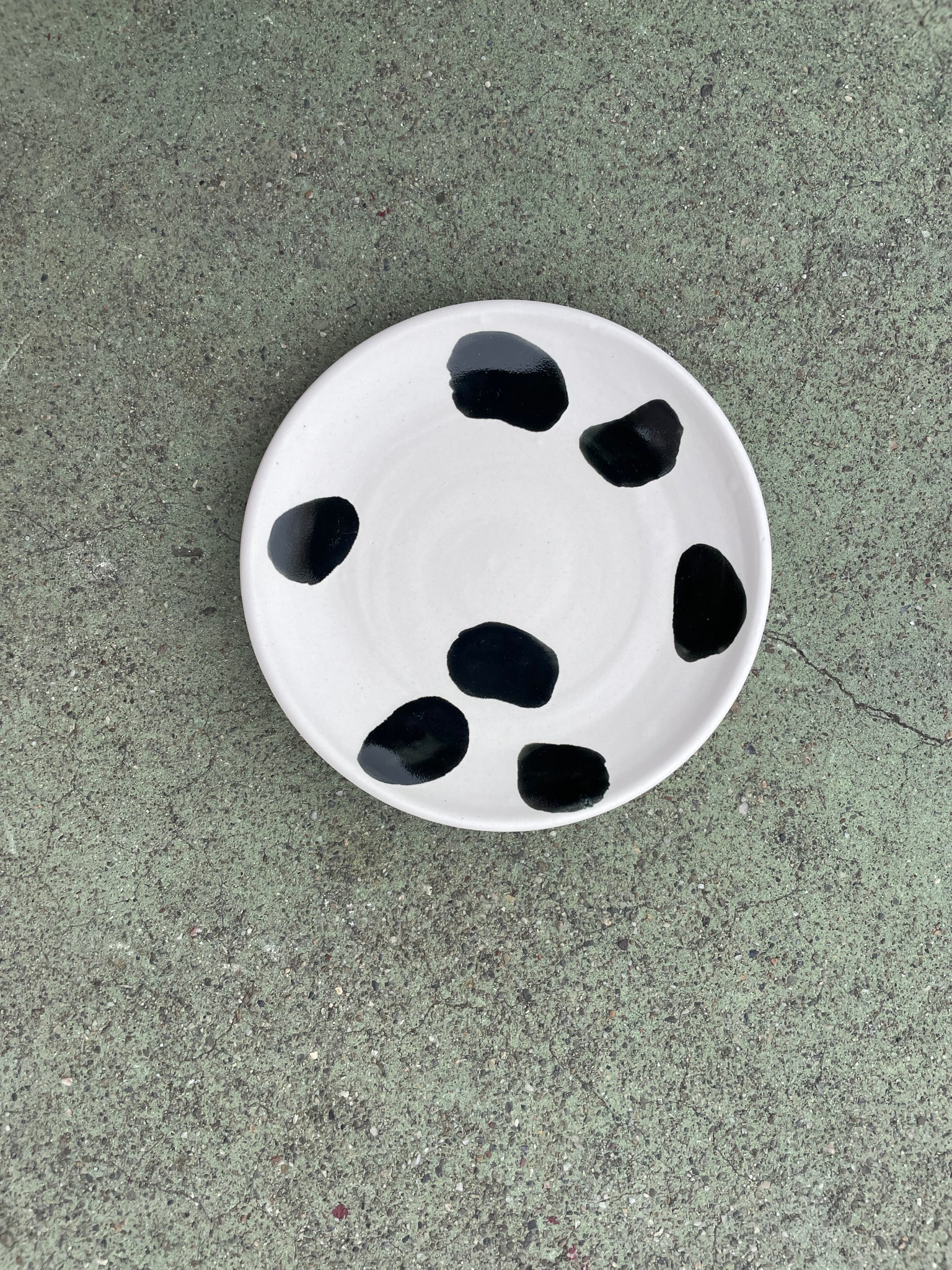 small plate matte with black polka dots