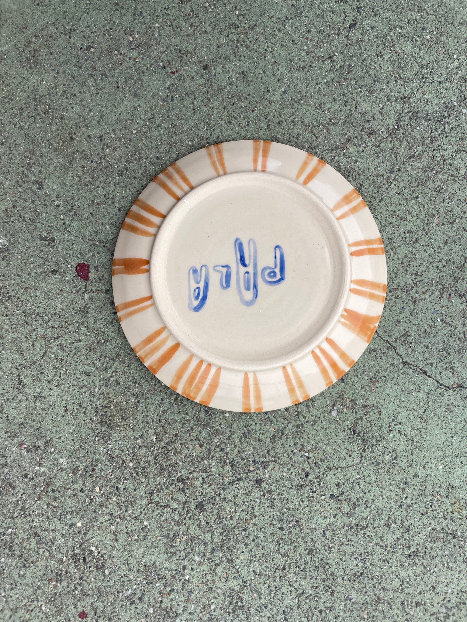 small plate brown plaid + green polka dots