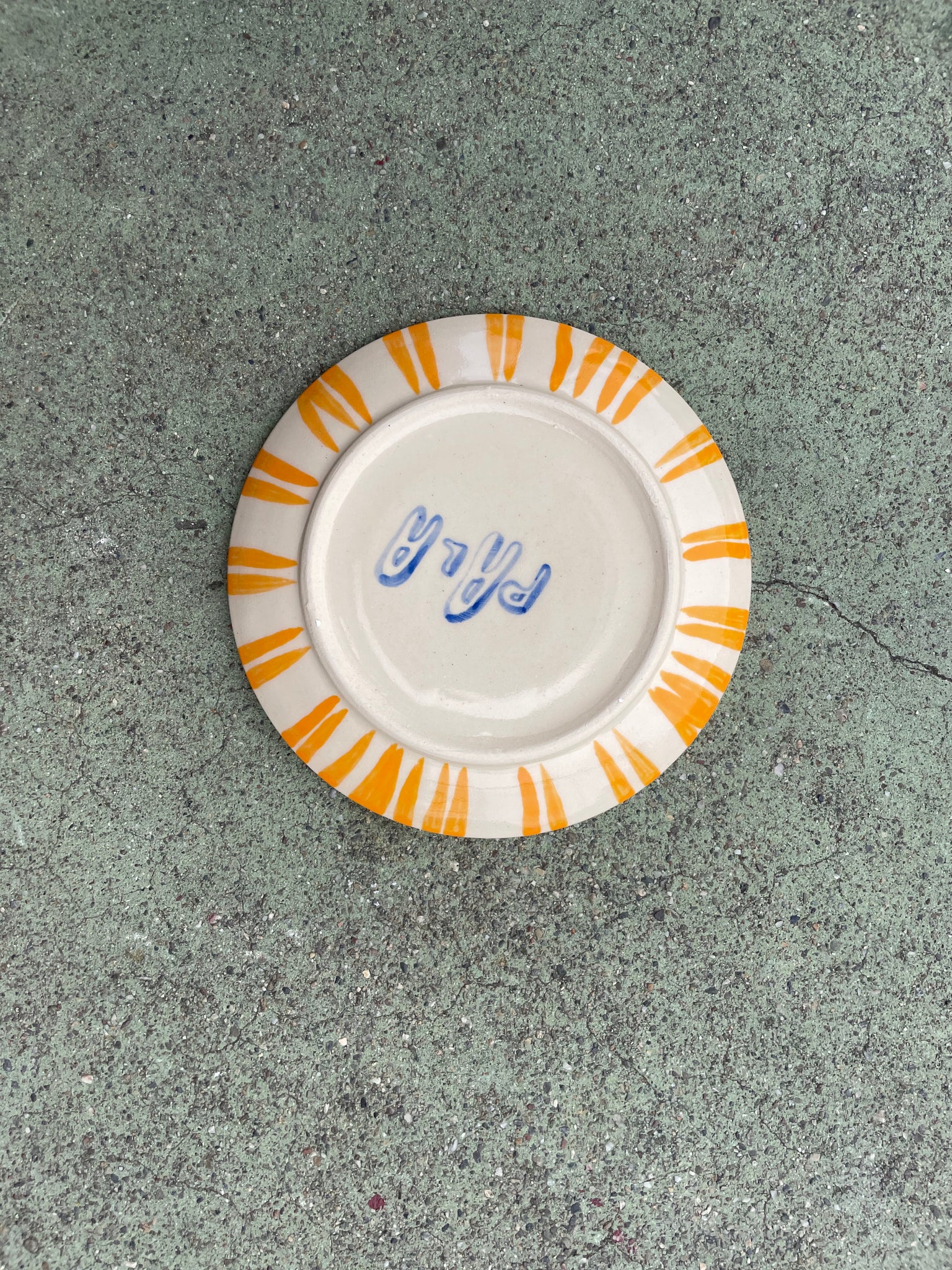 small plate orange plaid + green polka dots