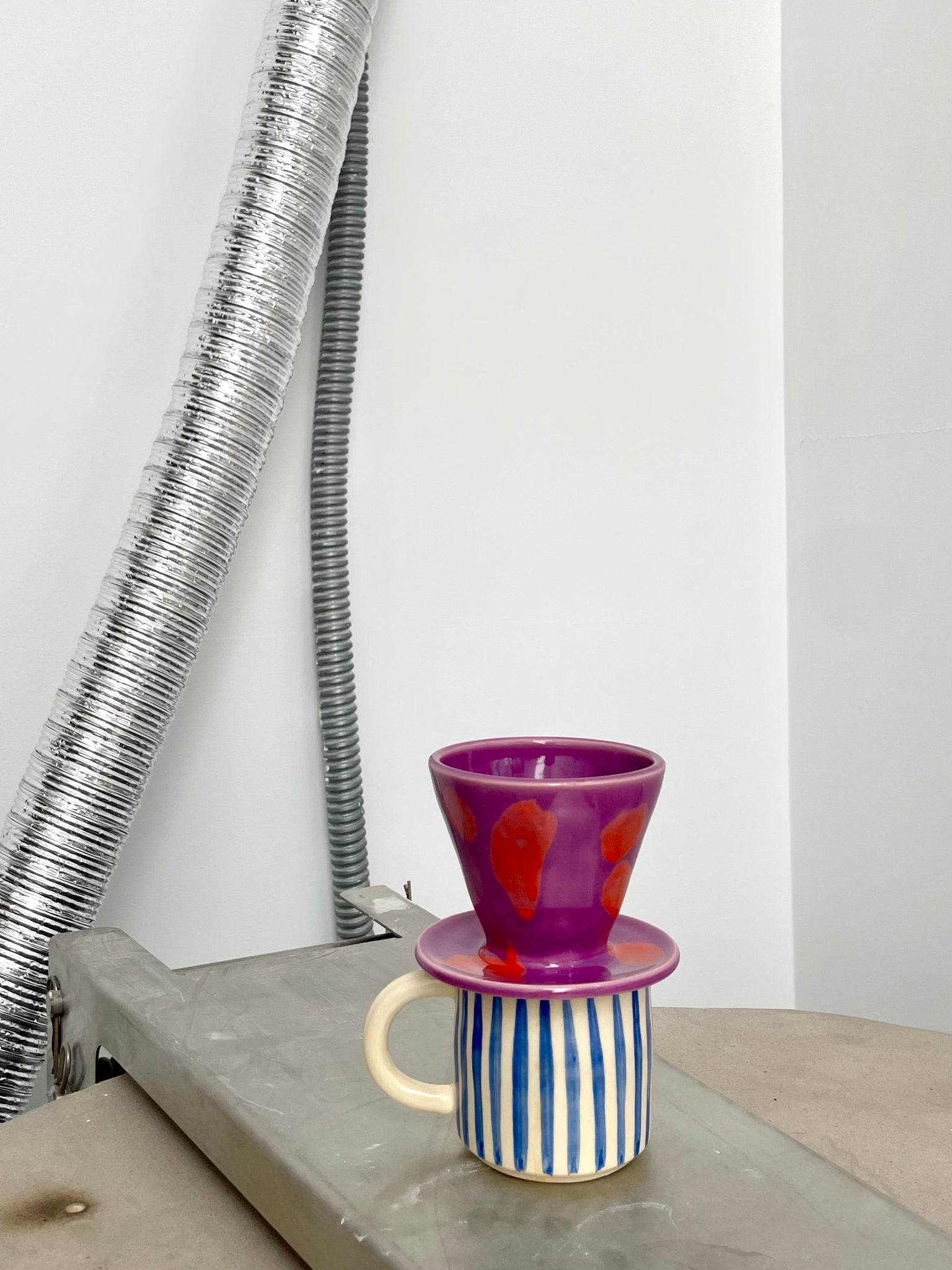 Purple + red splotches pour over