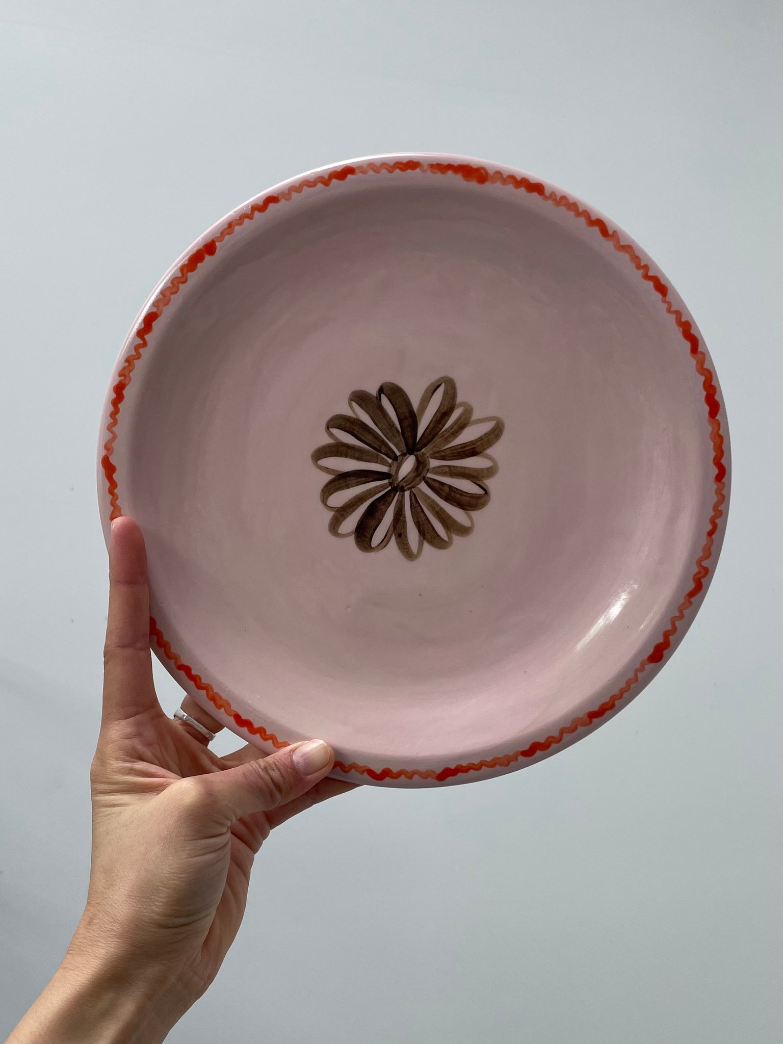 Red ribbon chocolate flower dinner plate